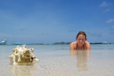 Girl in shallows at Los Roques Beach, Venezuela